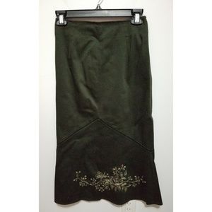 Dark green long skirt with flower detail